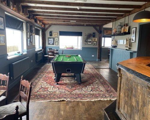 A newly refurbished pool table and a poker table for all your entertainment needs